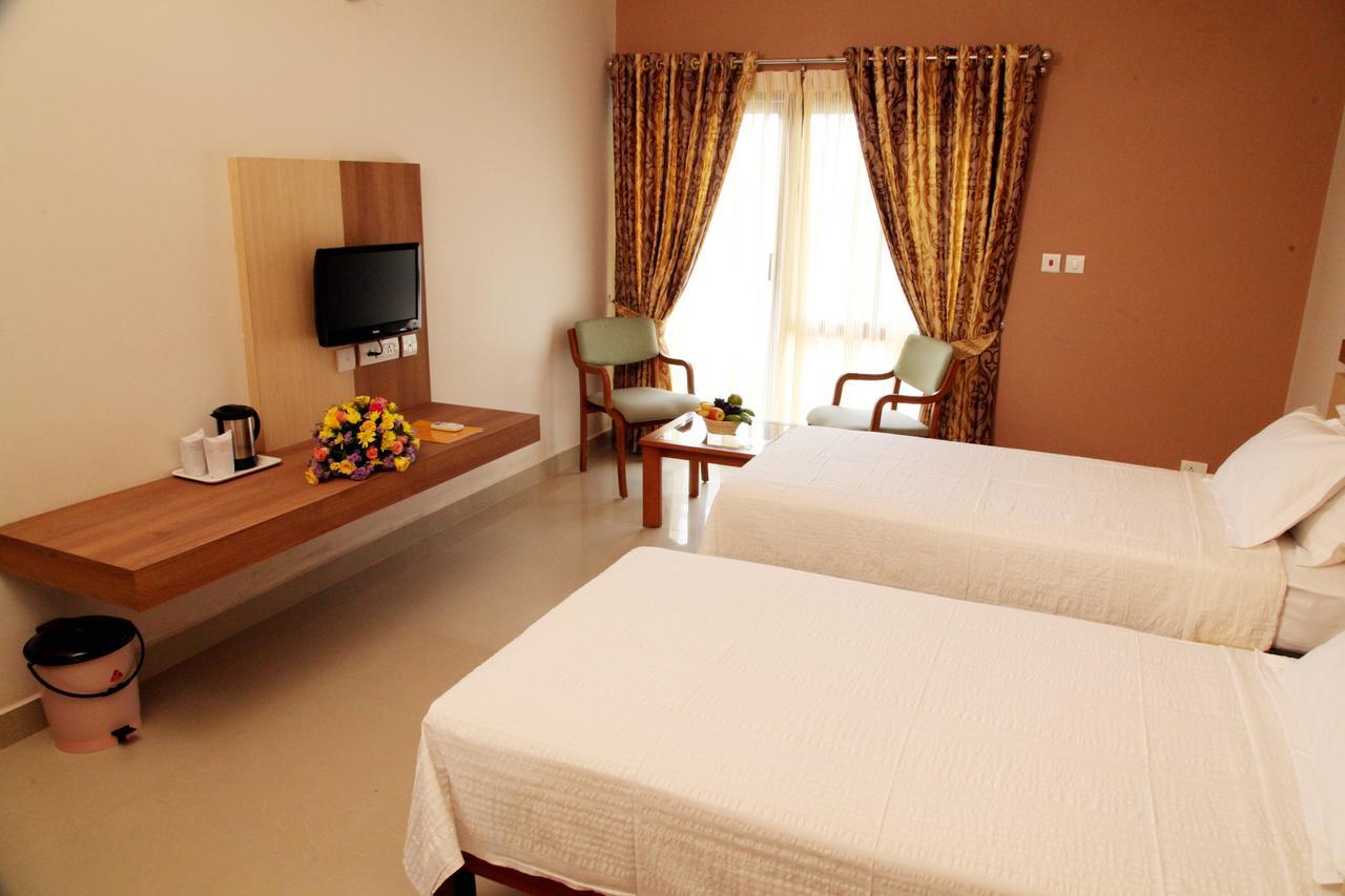 Hotel Polariz Parassinikkadavu Room photo